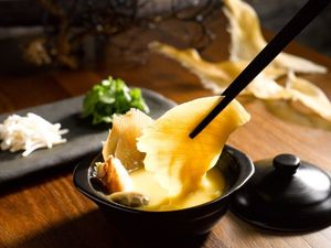 Signature Claypot Shark's Fin Soup with Crabmeat & Mushroom served with Beansprouts & Coriander Leaf