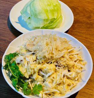 Scrambled Egg with Sautéed Shark's Fin & Crabmeat served on Crispy Lettuce