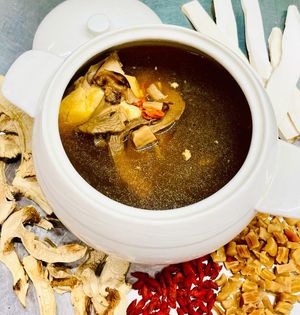 Double-Boiled Kampong Chicken Soup  With Matsutake And Conpoy – 4 Persons