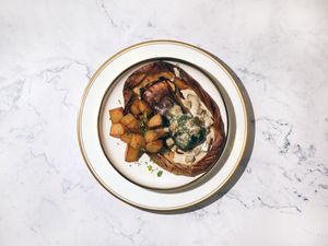 Salmon En Papillote with Wild Mushroom Velouté